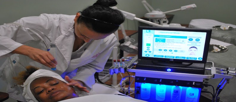 Woman receiving electrolysis service.