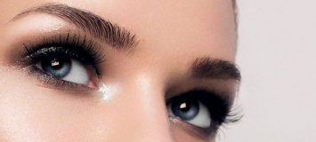 Close-up of a woman's eyes and eyebrows.