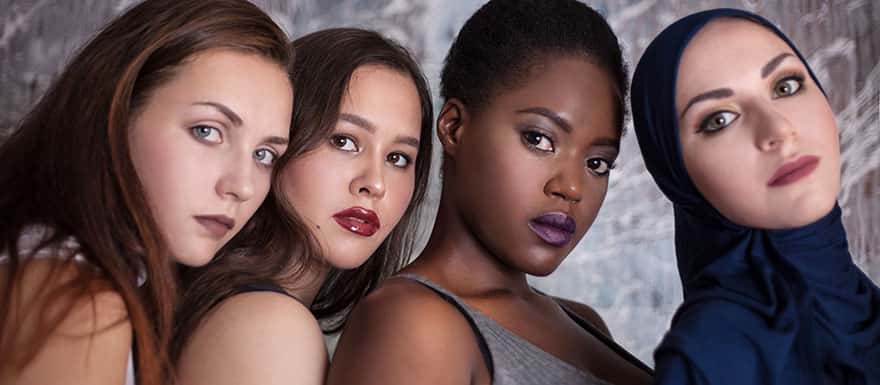 Four women with different nationalities represented posing together.