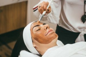 Boca Beauty Academy Esthetician Giving Facial to Client Boca Raton and Parkland, FL