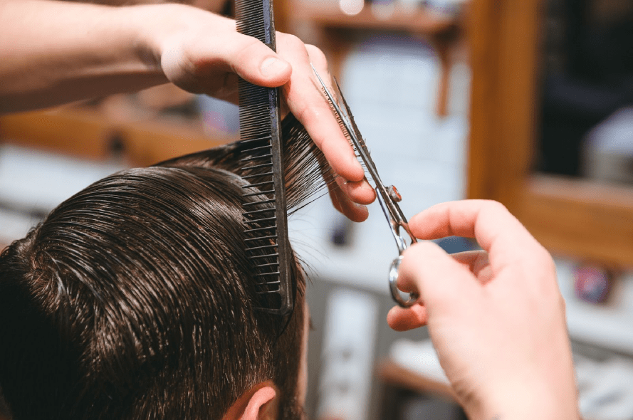 Man receiving a haircut.